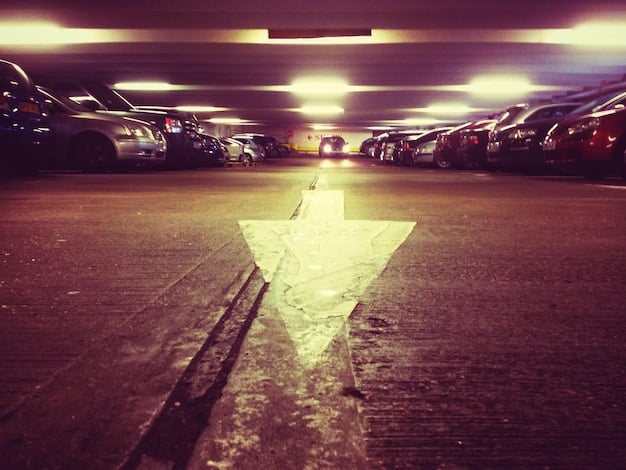 A car dealership with empty parking spots, indicating a decrease in car sales due to lower consumer confidence.