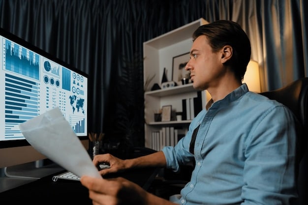 A young professional analyzing data on a computer screen in a modern office environment. The screen displays graphs, charts, and code snippets, suggesting a focus on data analysis and technical skills.