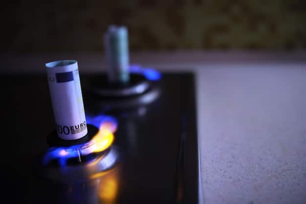 A close-up shot of a smart water sensor installed under a kitchen sink, showing its compact size and the pipes it's monitoring for leaks.