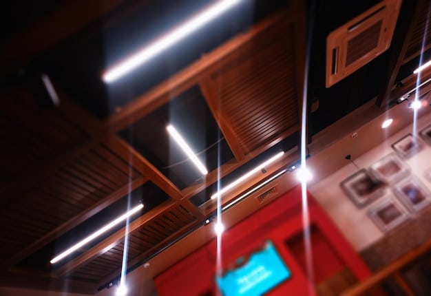 A detailed view of smart lighting in a home theater, showing how recessed lights, LED strips, and smart bulbs are used to create ambient and dynamic lighting effects. The lights are dimmed to enhance the viewing experience.