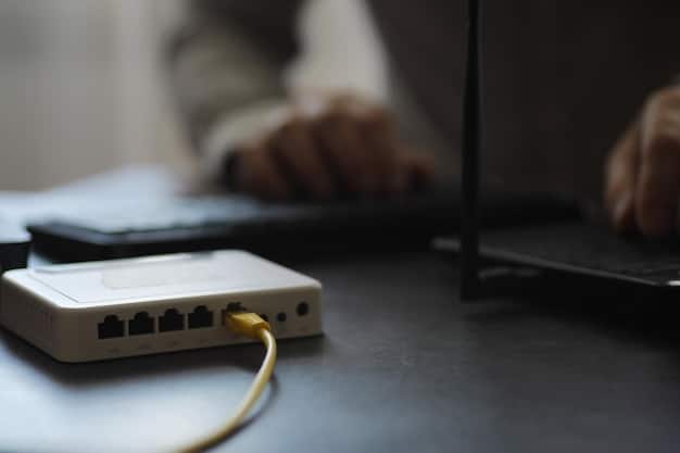 Close-up shot of a router with blinking lights, tangled ethernet cables, and a hand reaching to unplug the power cord. The background is a cluttered home office.