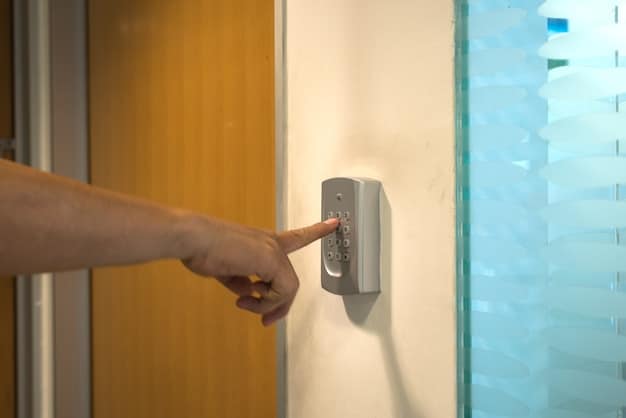 A close-up of a smart lock being installed on a door. The person installing the lock is using a screwdriver, and various parts of the smart lock are visible, including the keypad and the mounting plate. The door is a standard wooden door, and the background is a typical home entryway.