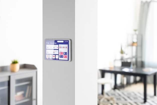 Close-up of a smart home security system control panel displaying a notification of a triggered alarm. The panel is mounted on a wall in a modern living room.