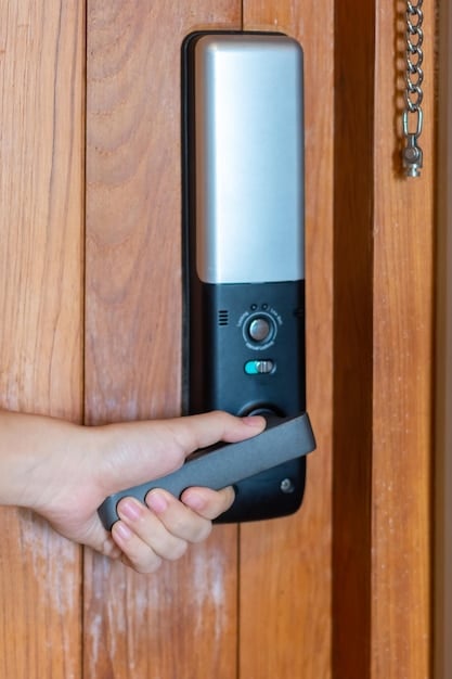 A close-up shot of a smart door lock being installed on a front door. The lock features a keypad and a fingerprint scanner, highlighting the keyless entry capabilities. The door is part of a modern home with a well-lit porch.