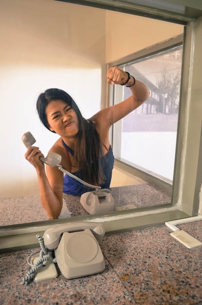 A renter attaching a small, discreet window sensor to their apartment window frame, showcasing the ease and simplicity of installation while emphasizing the added security it provides by detecting unauthorized entry.