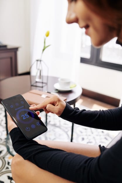 A close-up shot of a smart thermostat displaying real-time energy usage data and offering options for scheduling and remote control. The background shows a blurred image of a living room with energy-efficient lighting.